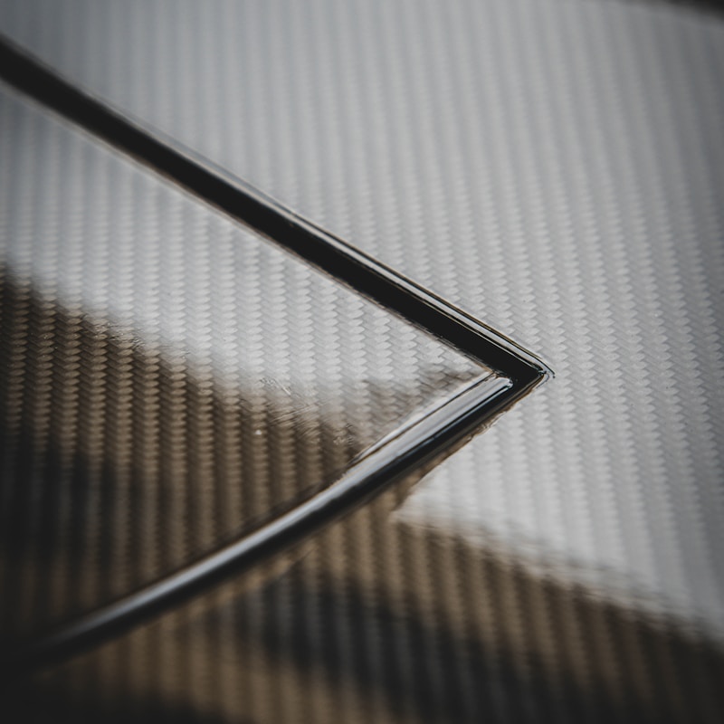 Macro of a brushed and carbon-look textured surface