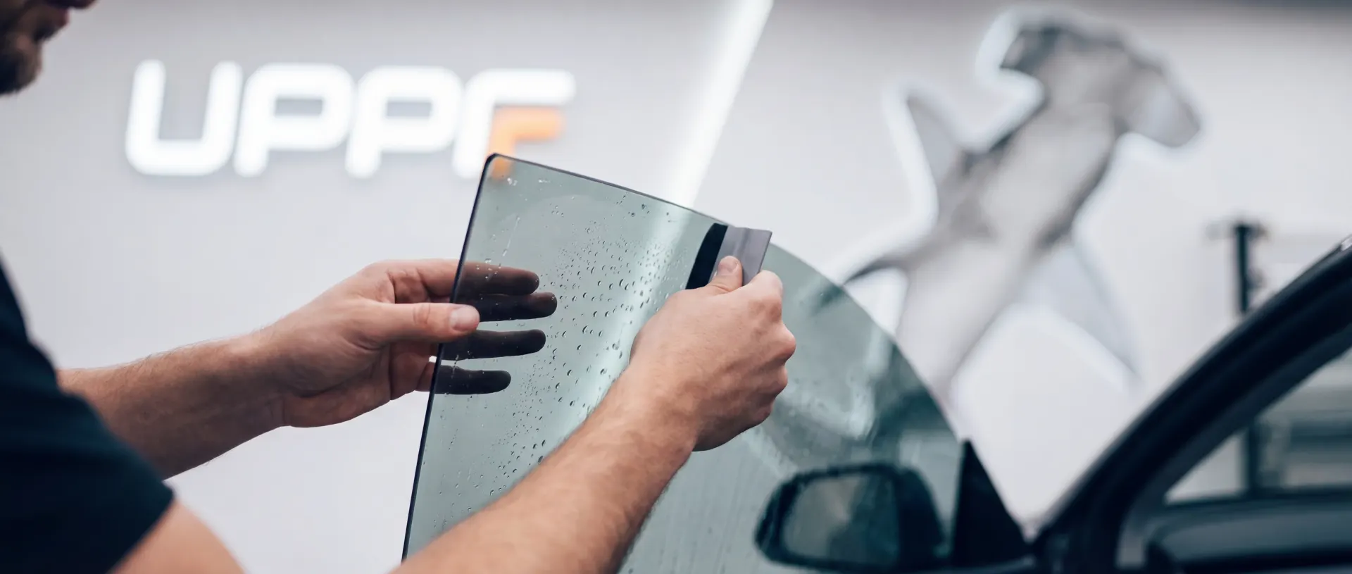 Ceramic window tint installation at UPPF Studio Houston